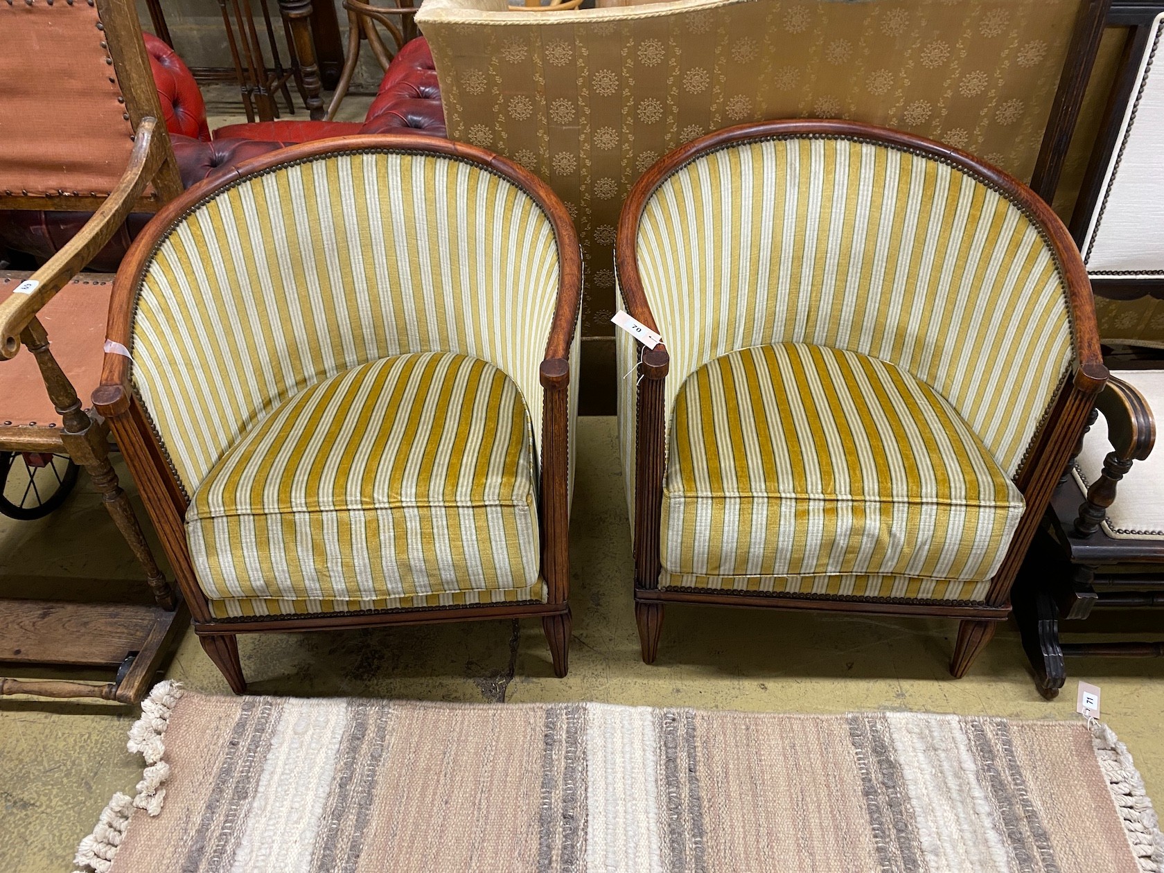A pair of Art Deco style Continental beech upholstered tub chairs, width 70cm, depth 62cm, height 76cm